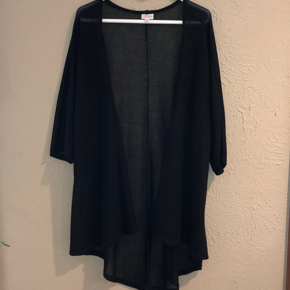 Loose fitting and flowy knit long cardigan